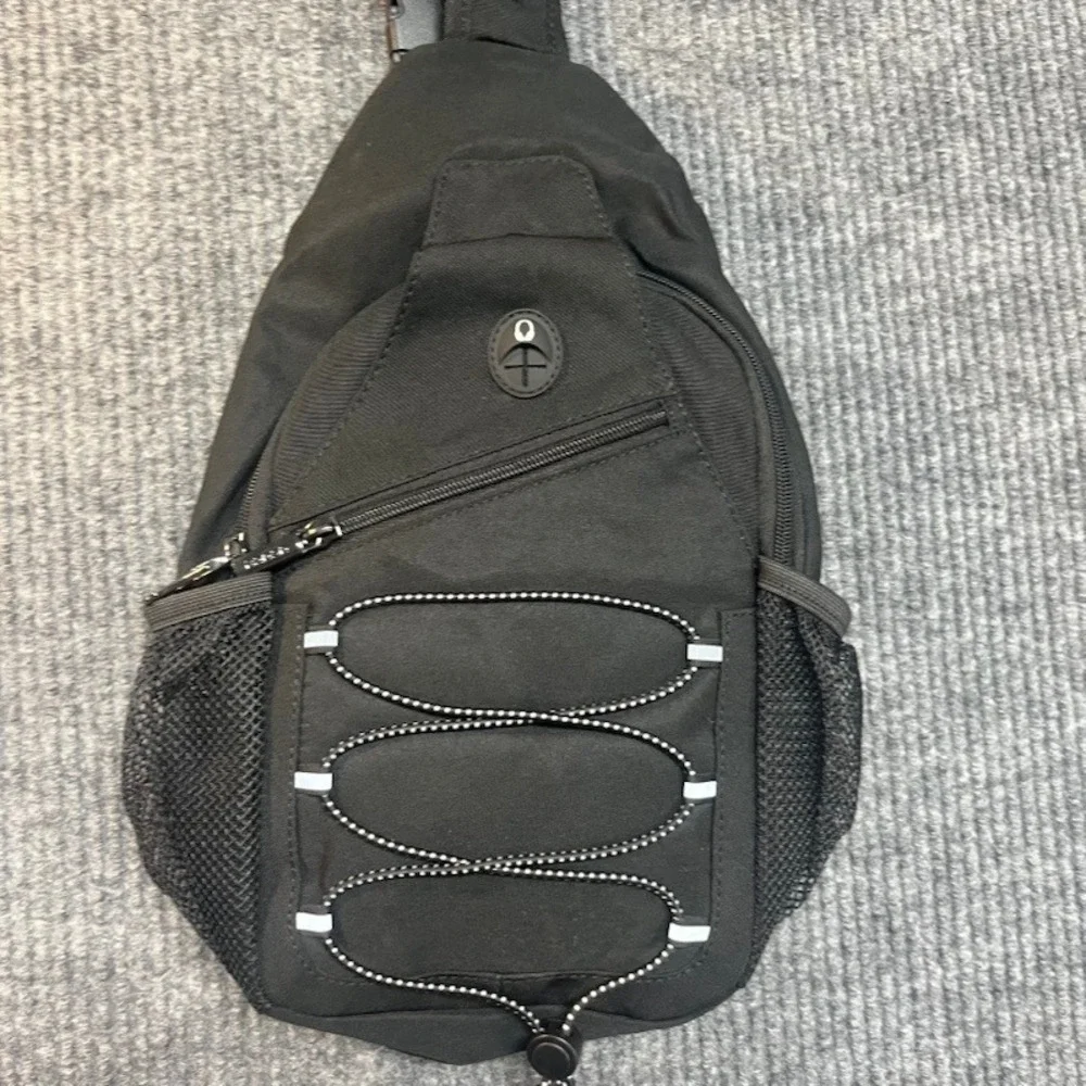 Black Sling Backpack Crossbody Shoulder Bag with Bungee Cord and Headphone Port